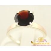 Серебряное кольцо с гранатом и золотом 365гр